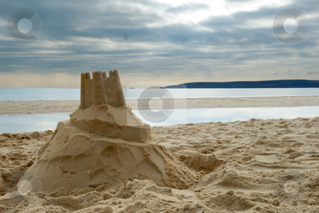 To use this stock image in your creative project, please select the size you need over to the right and click the "Add to Cart" button.
Your downloaded image will come with the Cutcaster watermark removed so don’t worry about the watermark you see on this page. Sandcastle stock photo, Close-up of sandcastle on Bournemouth beach, Dorset (UK) by Rebecca Campbell