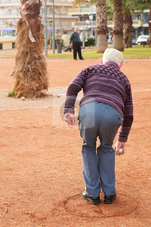 To use this stock image in your creative project, please select the size you need over to the right and click the "Add to Cart" button.
Your downloaded image will come with the Cutcaster watermark removed so don’t worry about the watermark you see on this page. Antibes #67 stock photo, An old man playing a ball game in Antibes, France. Movement on person's right hand. Copy space. by Sean Nel
