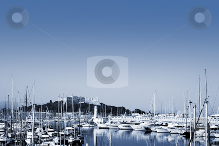 To use this stock image in your creative project, please select the size you need over to the right and click the "Add to Cart" button.
Your downloaded image will come with the Cutcaster watermark removed so don’t worry about the watermark you see on this page. Antibes #277 stock photo, A harbor in Antibes, France. Blue tone. Copy space. by Sean Nel