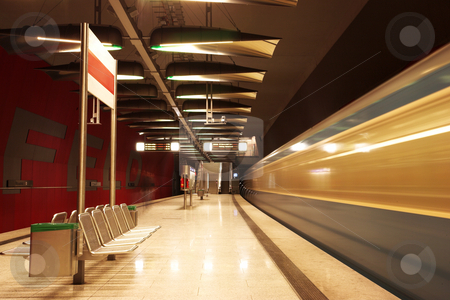 To use this stock image in your creative project, please select the size you need over to the right and click the "Add to Cart" button.
Your downloaded image will come with the Cutcaster watermark removed so don’t worry about the watermark you see on this page. Munich #35 stock photo, Moving train in a underground train station by Sean Nel