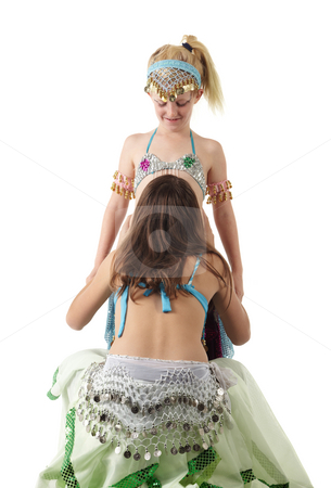 To use this stock image in your creative project, please select the size you need over to the right and click the "Add to Cart" button.
Your downloaded image will come with the Cutcaster watermark removed so don’t worry about the watermark you see on this page. Two young belly dancing girls stock photo, Two young Caucasian belly dancing girls in beautiful decorated clothes on white background. Not isolated by Sean Nel