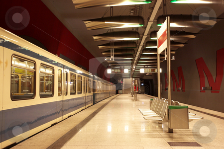 To use this stock image in your creative project, please select the size you need over to the right and click the "Add to Cart" button.
Your downloaded image will come with the Cutcaster watermark removed so don’t worry about the watermark you see on this page. Munich #35 stock photo, Train in a underground train station by Sean Nel