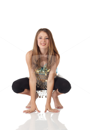 To use this stock image in your creative project, please select the size you need over to the right and click the "Add to Cart" button.
Your downloaded image will come with the Cutcaster watermark removed so don’t worry about the watermark you see on this page. Young belly dancing girl stock photo, Young Caucasian belly dancing girl in beautiful decorated clothes on white background and reflective floor. Not isolated by Sean Nel
