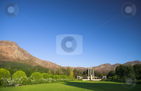 To use this stock image in your creative project, please select the size you need over to the right and click the "Add to Cart" button.
Your downloaded image will come with the Cutcaster watermark removed so don’t worry about the watermark you see on this page. The Huguenot Monument stock photo, The Huguenot Monument in summer with green grass and blooming gardens in Franschhoek, Western Cape, South Africa by Sean Nel