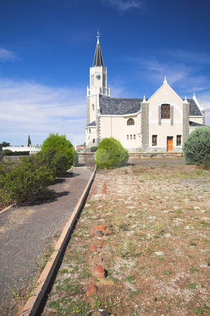 To use this stock image in your creative project, please select the size you need over to the right and click the "Add to Cart" button.
Your downloaded image will come with the Cutcaster watermark removed so don’t worry about the watermark you see on this page. Dutch reformed church stock photo, Blue sky with dramatic clouds over a desert town Dutch Reformed Church, Hanover, South Africa by Sean Nel