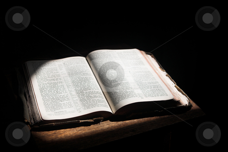 To use this stock image in your creative project, please select the size you need over to the right and click the "Add to Cart" button.
Your downloaded image will come with the Cutcaster watermark removed so don’t worry about the watermark you see on this page. Open bible lying on a table stock photo, Old open bible lying on a wooden table in a beam of sunlight (not an isolated image) Shallow Depth of field by Sean Nel