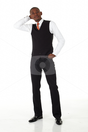 To use this stock image in your creative project, please select the size you need over to the right and click the "Add to Cart" button.
Your downloaded image will come with the Cutcaster watermark removed so don’t worry about the watermark you see on this page. Black African Businessman stock photo, Young black african businessman in a formal suite and on a white background - NOT ISOLATED by Sean Nel