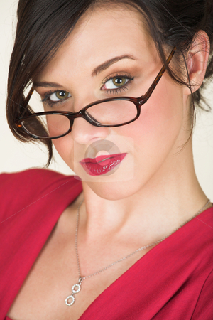 To use this stock image in your creative project, please select the size you need over to the right and click the "Add to Cart" button.
Your downloaded image will come with the Cutcaster watermark removed so don’t worry about the watermark you see on this page. Young caucasian businesswoman stock photo, Young adult brunette businesswoman with horn rimmed glasses and a red dress. She is Caucasian and wears bright red lipstick. by Sean Nel
