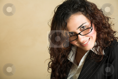 To use this stock image in your creative project, please select the size you need over to the right and click the "Add to Cart" button.
Your downloaded image will come with the Cutcaster watermark removed so don’t worry about the watermark you see on this page. Young adult businesswoman stock photo, Portrait of a beautiful young adult Caucasian businesswoman with light skin and curly brown hair, brown eyes and pink lips, wearing a pinstripe Jacket and white shirt with spectacles by Sean Nel