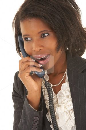 To use this stock image in your creative project, please select the size you need over to the right and click the "Add to Cart" button.
Your downloaded image will come with the Cutcaster watermark removed so don’t worry about the watermark you see on this page. Sexy african businesswoman stock photo, Sexy young adult african businesswoman in a business suit on a white background with a telephone. NOT ISOLATED by Sean Nel