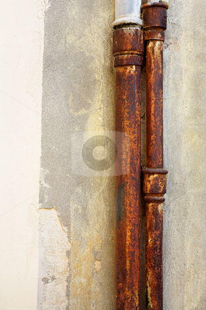 To use this stock image in your creative project, please select the size you need over to the right and click the "Add to Cart" button.
Your downloaded image will come with the Cutcaster watermark removed so don’t worry about the watermark you see on this page. Rusted pipes on the wall stock photo, Rusted pipes against a brown wall. Copy space by Sean Nel