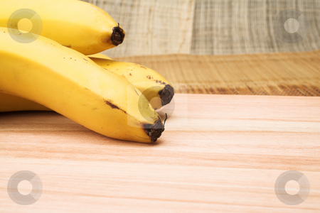 To use this stock image in your creative project, please select the size you need over to the right and click the "Add to Cart" button.
Your downloaded image will come with the Cutcaster watermark removed so don’t worry about the watermark you see on this page. Banana #1 stock photo, Three bananas on a wooden cutting board - copy space by Sean Nel