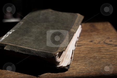 To use this stock image in your creative project, please select the size you need over to the right and click the "Add to Cart" button.
Your downloaded image will come with the Cutcaster watermark removed so don’t worry about the watermark you see on this page. Leather covered bible lying on a table stock photo, Leather covered old bible lying on a wooden table in a beam of sunlight (not an isolated image) Shallow Depth of field by Sean Nel
