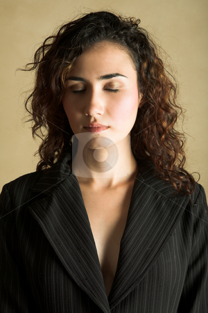 To use this stock image in your creative project, please select the size you need over to the right and click the "Add to Cart" button.
Your downloaded image will come with the Cutcaster watermark removed so don’t worry about the watermark you see on this page. Young adult woman stock photo, Portrait of a beautiful young adult Caucasian woman with light skin and curly brown hair, closed eyes and pink lips, wearing a pinstripe Jacket by Sean Nel