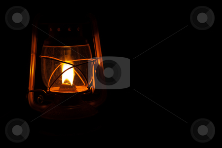 To use this stock image in your creative project, please select the size you need over to the right and click the "Add to Cart" button.
Your downloaded image will come with the Cutcaster watermark removed so don’t worry about the watermark you see on this page. Storm Lantern stock photo, Yellow storm lantern burning at night on a wet table by Sean Nel