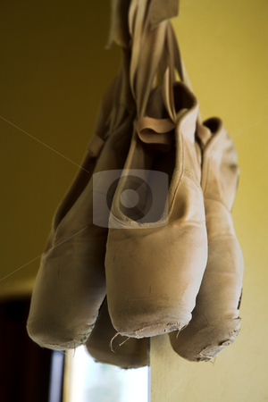 To use this stock image in your creative project, please select the size you need over to the right and click the "Add to Cart" button.
Your downloaded image will come with the Cutcaster watermark removed so don’t worry about the watermark you see on this page. Pointe Shoes #4 stock photo, Pair of Ballet shoes hanging on the wall against a mirror by Sean Nel