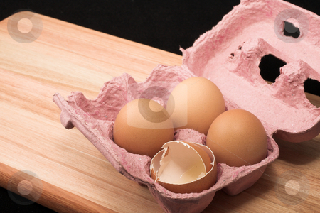 To use this stock image in your creative project, please select the size you need over to the right and click the "Add to Cart" button.
Your downloaded image will come with the Cutcaster watermark removed so don’t worry about the watermark you see on this page. Eggs #2 stock photo, Eggs in an eggholder on a wooden cutting board by Sean Nel