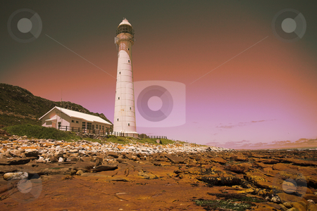 To use this stock image in your creative project, please select the size you need over to the right and click the "Add to Cart" button.
Your downloaded image will come with the Cutcaster watermark removed so don’t worry about the watermark you see on this page. Lighthouse at sunset stock photo, The Slangkop Lighthouse at sunset - Kommetjie, Western Cape. The Tallest Lighthouse in South Africa by Sean Nel