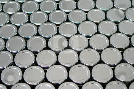 To use this stock image in your creative project, please select the size you need over to the right and click the "Add to Cart" button.
Your downloaded image will come with the Cutcaster watermark removed so don’t worry about the watermark you see on this page. Tins stock photo, Metal lids of packaging tins by Sean Nel