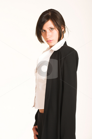 To use this stock image in your creative project, please select the size you need over to the right and click the "Add to Cart" button.
Your downloaded image will come with the Cutcaster watermark removed so don’t worry about the watermark you see on this page. Business Woman #274 stock photo, Business woman dressed in a pencil skirt and jacket. by Sean Nel