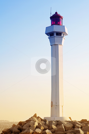 To use this stock image in your creative project, please select the size you need over to the right and click the "Add to Cart" button.
Your downloaded image will come with the Cutcaster watermark removed so don’t worry about the watermark you see on this page. Cannes Lighthouse stock photo, The lighthouse at the edge of the harbor (Port Le Vieux) in Cannes, France by Sean Nel