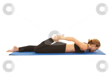 To use this stock image in your creative project, please select the size you need over to the right and click the "Add to Cart" button.
Your downloaded image will come with the Cutcaster watermark removed so don’t worry about the watermark you see on this page. Pilates exercise series stock photo, Fit young brunette pilates instructor showing different exercises on a white background a blue yoga mat. White background NOT ISOLATED by Sean Nel