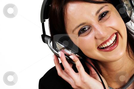 To use this stock image in your creative project, please select the size you need over to the right and click the "Add to Cart" button.
Your downloaded image will come with the Cutcaster watermark removed so don’t worry about the watermark you see on this page. Music #2 stock photo, Woman with earphones - High key, High Saturation by Sean Nel