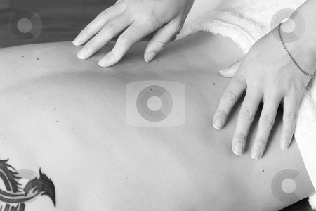 To use this stock image in your creative project, please select the size you need over to the right and click the "Add to Cart" button.
Your downloaded image will come with the Cutcaster watermark removed so don’t worry about the watermark you see on this page. Massage #9 stock photo, Masseuse working on a man - High Key BW by Sean Nel