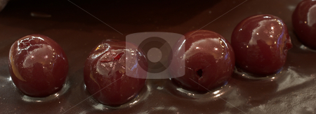 To use this stock image in your creative project, please select the size you need over to the right and click the "Add to Cart" button.
Your downloaded image will come with the Cutcaster watermark removed so don’t worry about the watermark you see on this page. Pastry #40 stock photo, Glazed Chocolate cake and Cherries in a French Patisserie and Chocolaterie - Shallow Depth of Field, by Sean Nel