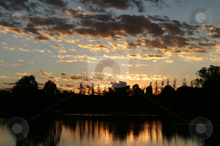To use this stock image in your creative project, please select the size you need over to the right and click the "Add to Cart" button.
Your downloaded image will come with the Cutcaster watermark removed so don’t worry about the watermark you see on this page. Sunset stock photo, Sunset over water by Sean Nel