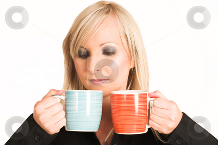 To use this stock image in your creative project, please select the size you need over to the right and click the "Add to Cart" button.
Your downloaded image will come with the Cutcaster watermark removed so don’t worry about the watermark you see on this page. Business Woman #299 stock photo, Blond business woman dressed in black trousers and a black shirt. Holding two mugs. by Sean Nel