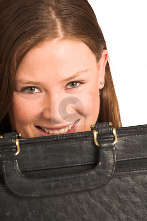 To use this stock image in your creative project, please select the size you need over to the right and click the "Add to Cart" button.
Your downloaded image will come with the Cutcaster watermark removed so don’t worry about the watermark you see on this page. Business Woman #205(GS) stock photo, Business woman hiding behind a black leather suitcase by Sean Nel