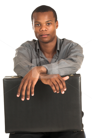 To use this stock image in your creative project, please select the size you need over to the right and click the "Add to Cart" button.
Your downloaded image will come with the Cutcaster watermark removed so don’t worry about the watermark you see on this page. Businessman #143 stock photo, Businessman with grey shirt, sitting on a chair, holding a black leather suitcase. by Sean Nel