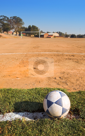To use this stock image in your creative project, please select the size you need over to the right and click the "Add to Cart" button.
Your downloaded image will come with the Cutcaster watermark removed so don’t worry about the watermark you see on this page. Rural soccer field stock photo, Dirty soccer ball on a rural football field by Sean Nel