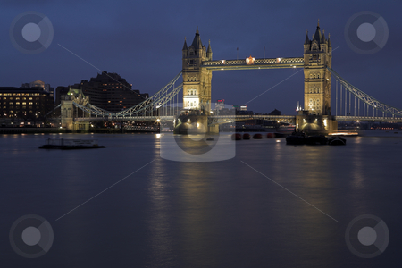 To use this stock image in your creative project, please select the size you need over to the right and click the "Add to Cart" button.
Your downloaded image will come with the Cutcaster watermark removed so don’t worry about the watermark you see on this page. Tower Bridge #7 stock photo, The bascule Tower bridge in London, Night Scene over the Thames - Copy Space by Sean Nel