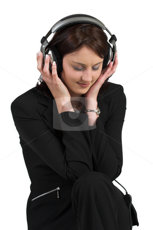 To use this stock image in your creative project, please select the size you need over to the right and click the "Add to Cart" button.
Your downloaded image will come with the Cutcaster watermark removed so don’t worry about the watermark you see on this page. Luzaan Roodt #11 stock photo, Woman in formal black suit, headset on head, listening to music - eyes closed by Sean Nel