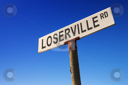 To use this stock image in your creative project, please select the size you need over to the right and click the "Add to Cart" button.
Your downloaded image will come with the Cutcaster watermark removed so don’t worry about the watermark you see on this page. Sign against blue sky stock photo, Weathered old road sign against a clear blue sky - Concept image: Road to LOSERVILLE by Sean Nel