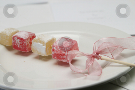 To use this stock image in your creative project, please select the size you need over to the right and click the "Add to Cart" button.
Your downloaded image will come with the Cutcaster watermark removed so don’t worry about the watermark you see on this page. Turkish delight stock photo, Turkish delight as a weding dessert by Sean Nel