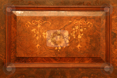 To use this stock image in your creative project, please select the size you need over to the right and click the "Add to Cart" button.
Your downloaded image will come with the Cutcaster watermark removed so don’t worry about the watermark you see on this page. Wooden inlay stock photo, Wooden inlays on an old piano by Sean Nel