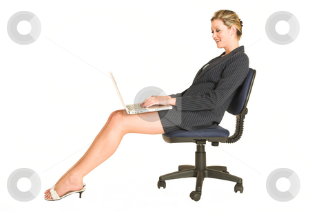 To use this stock image in your creative project, please select the size you need over to the right and click the "Add to Cart" button.
Your downloaded image will come with the Cutcaster watermark removed so don’t worry about the watermark you see on this page. Laura Hopton #1 stock photo, Business woman on office chair with Laptop on her lap - looking down by Sean Nel
