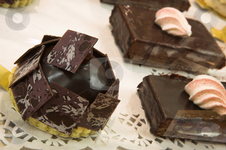 To use this stock image in your creative project, please select the size you need over to the right and click the "Add to Cart" button.
Your downloaded image will come with the Cutcaster watermark removed so don’t worry about the watermark you see on this page. Pastry #24 stock photo, Chocolate Flaked Death by Chocolate, White and Pink Meringue on a Chocolate Brownie by Sean Nel