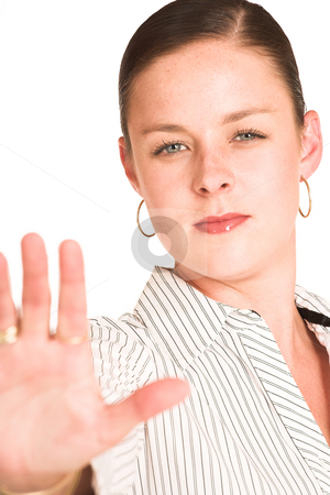 To use this stock image in your creative project, please select the size you need over to the right and click the "Add to Cart" button.
Your downloaded image will come with the Cutcaster watermark removed so don’t worry about the watermark you see on this page. Business Woman #35 stock photo, Business woman dressed in a white pinstripe shirt. Holding up hand. Shallow DOF, hand out of focus, face in focus by Sean Nel