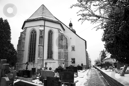 To use this stock image in your creative project, please select the size you need over to the right and click the "Add to Cart" button.
Your downloaded image will come with the Cutcaster watermark removed so don’t worry about the watermark you see on this page. Kirchberg #11 stock photo, Graveyard covered in snow. Black and white. Copy space. by Sean Nel