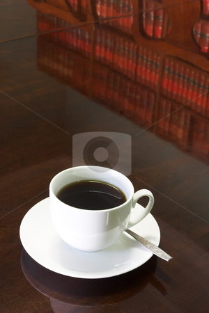 To use this stock image in your creative project, please select the size you need over to the right and click the "Add to Cart" button.
Your downloaded image will come with the Cutcaster watermark removed so don’t worry about the watermark you see on this page. Legal Coffee Cup #1 stock photo, White Coffee cup with Legal Library on table reflection by Sean Nel