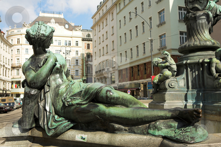 To use this stock image in your creative project, please select the size you need over to the right and click the "Add to Cart" button.
Your downloaded image will come with the Cutcaster watermark removed so don’t worry about the watermark you see on this page. Statues infront of buildings in Vienna stock photo, Statues infront of buildings in Vienna, Austria by Sean Nel