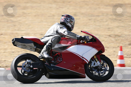 To use this stock image in your creative project, please select the size you need over to the right and click the "Add to Cart" button.
Your downloaded image will come with the Cutcaster watermark removed so don’t worry about the watermark you see on this page. Superbike #73 stock photo, High speed Superbike on the circuit by Sean Nel