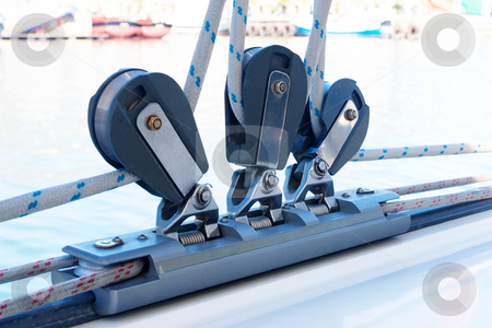 To use this stock image in your creative project, please select the size you need over to the right and click the "Add to Cart" button.
Your downloaded image will come with the Cutcaster watermark removed so don’t worry about the watermark you see on this page. Yacht #1 stock photo, Close-up of pulley and ropes on a yacht by Sean Nel