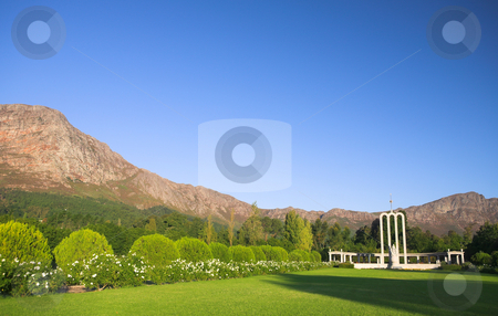 To use this stock image in your creative project, please select the size you need over to the right and click the "Add to Cart" button.
Your downloaded image will come with the Cutcaster watermark removed so don’t worry about the watermark you see on this page. The Huguenot Monument stock photo, The Huguenot Monument in summer with green grass and blooming gardens in Franschhoek, Western Cape, South Africa by Sean Nel