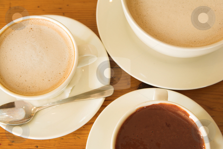 To use this stock image in your creative project, please select the size you need over to the right and click the "Add to Cart" button.
Your downloaded image will come with the Cutcaster watermark removed so don’t worry about the watermark you see on this page. Lunch #31 stock photo, Coffee and hot chocolate on a wooden table by Sean Nel