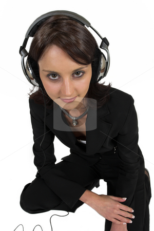 To use this stock image in your creative project, please select the size you need over to the right and click the "Add to Cart" button.
Your downloaded image will come with the Cutcaster watermark removed so don’t worry about the watermark you see on this page. Luzaan Roodt #16 stock photo, Business woman in formal black suit with headphones on head by Sean Nel